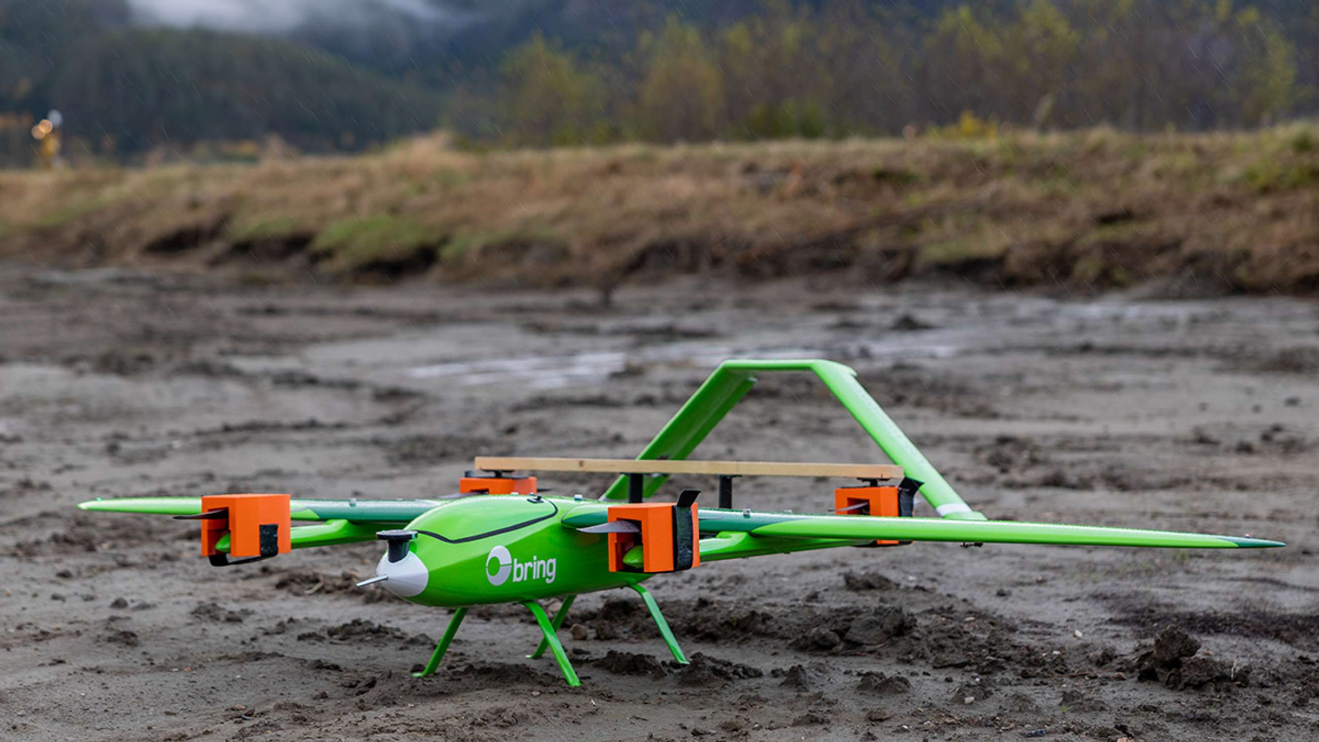 En grønn Bring-drone